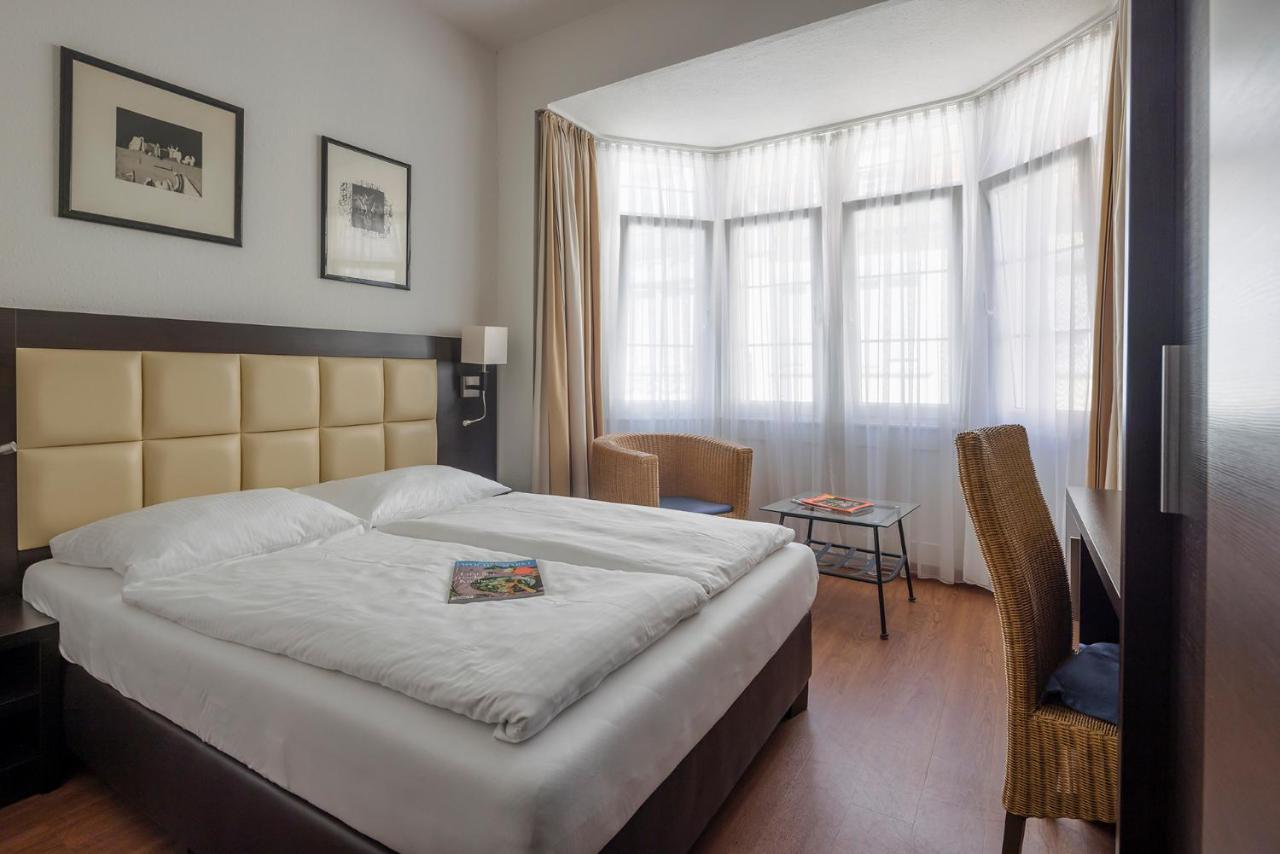 Hotel Minerva ไฟรบวร์กอิมไบรส์เกา ภายนอก รูปภาพ